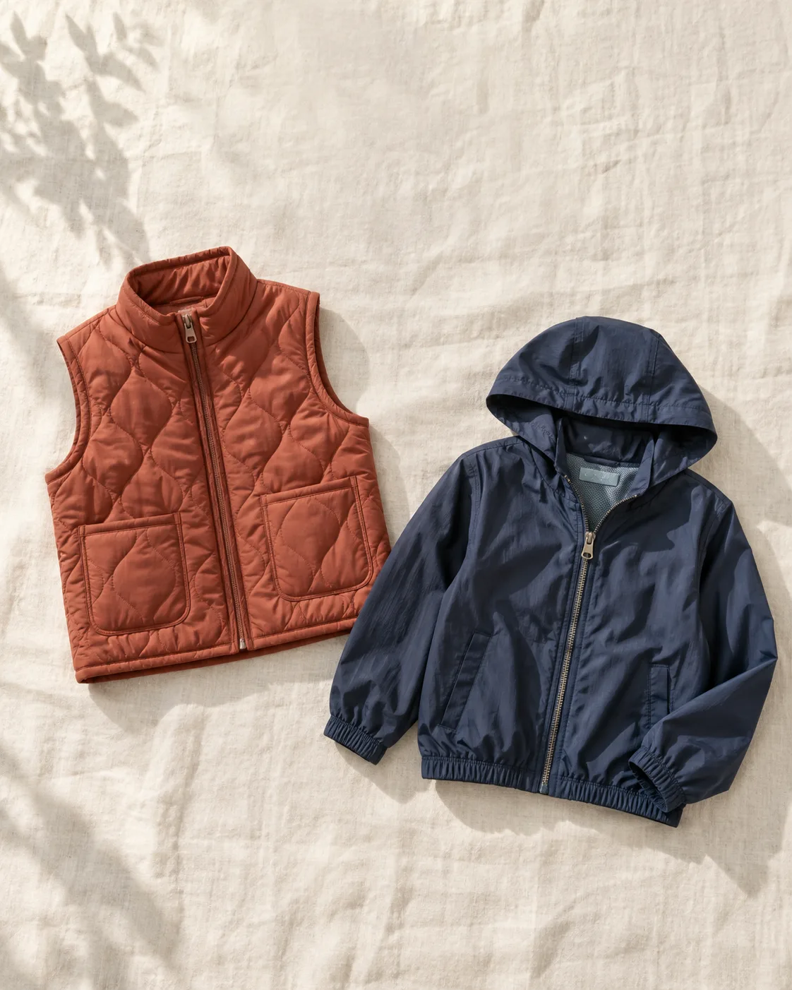 Terracotta vest and navy windbreaker